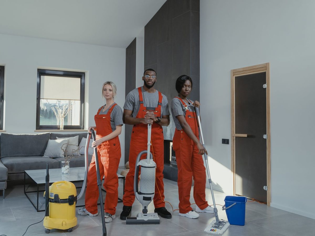 Cleaning team preparing equipment before a scheduled visit